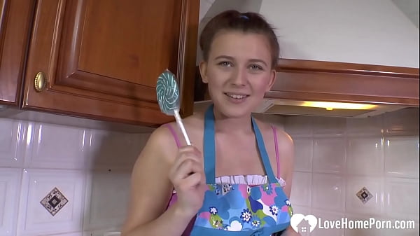 Hot MILF enjoys sucking on a lollipop
