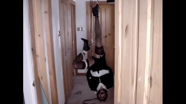 Suspended upside down by one ankle