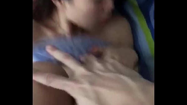 Shy petite Asian bites the pillow