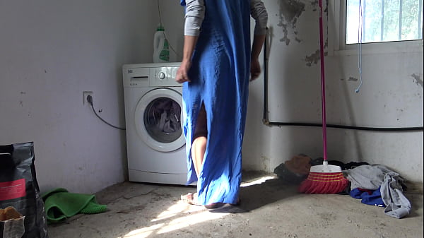 A Muslim maid is fucked doggystyle while doing the laundry