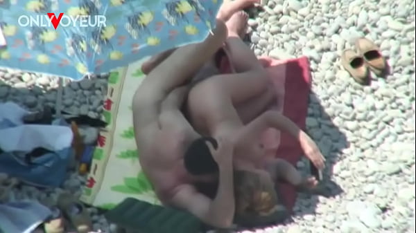 Beach Voyeur. Mature couple fucking under the shining sun