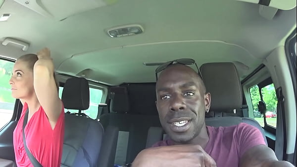 a young girl sucks a big black cock in a car park in the street in the middle of the afternoon.part1