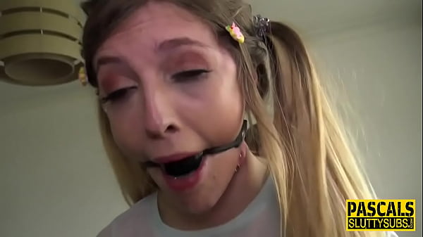 Kinky bdsm whore gagging on toy