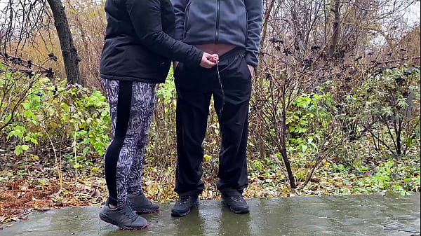 Sports stepmother-in-law after jogging in the park holds son-in-law's penis