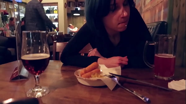 I took control of my stepsister's vibrator in the bar and brought her to orgasm.
