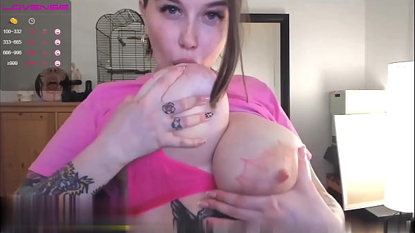 SUCKING HER OWN TITS