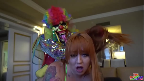 Busty Redhead Milf gets her pussy destroyed by clown