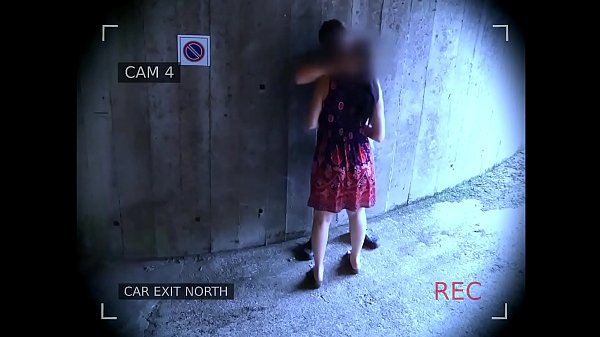 Young couple fucks in front of the garage exit and is caught by the surveillance camera