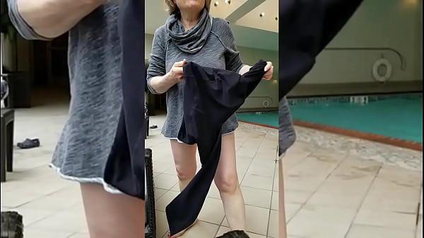 Sexy Grandma is Sexy at 66 in a black swimsuit