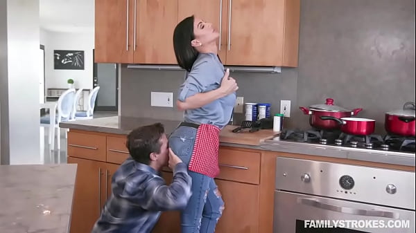 Perfect MILF Stepmom With Big Boobs Gets Fucked By Her Stepson In The Kitchen While Daddy Is Eating
