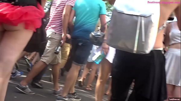 Festival Upskirt, frilly micro skirt with string panties. Great ass revealed!
