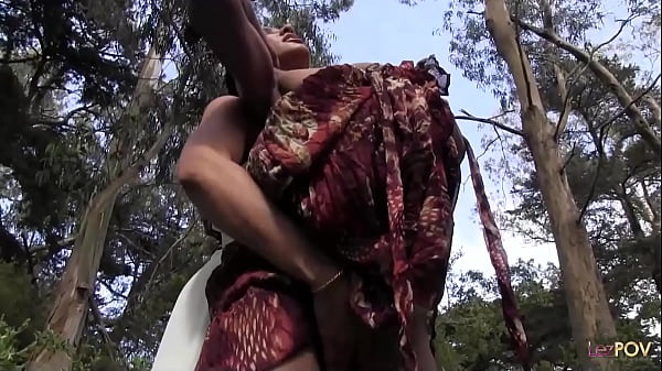 Outdoor interracial lesbian sex in a forest between a skinny ebony chick and a brunette with big tits