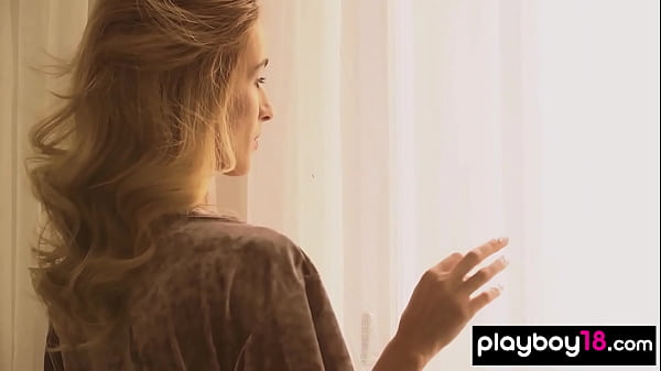 Skinny blonde Ukrainian teen Cara Mell taking off her sexy white lingerie