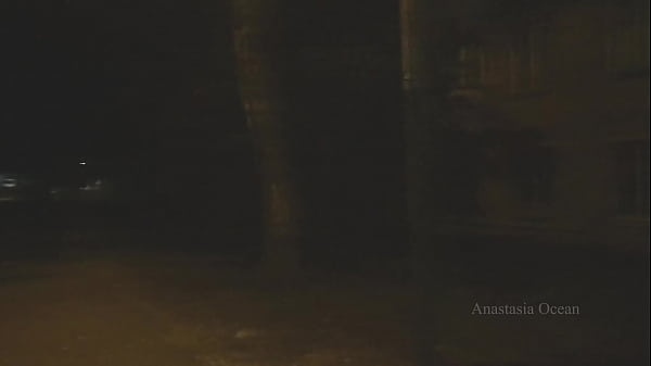 Naked woman walking on the city street in the early morning. Public.