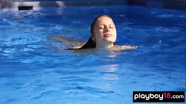 Nude tiny titted ukrainian blondie Clarice Elvira swimming in the pool