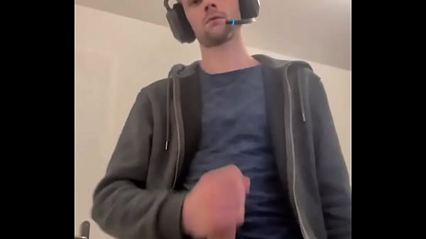 Game ON... and more! Gaming headset on, joystick in one hand... but the other one is... Thumbnail