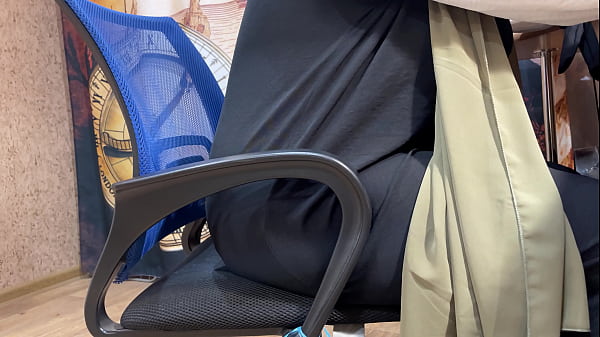Arab woman in hijab masturbates through her panties while working