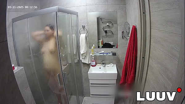 LUUV. A brunette showers, used to amateur cameras, showing her natural body Thumbnail