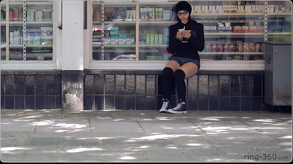 Brunette girl with skateboard flashing in public