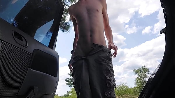 Young naked twink cruising at a nude beach and publicly jerking off til he gets a load in car