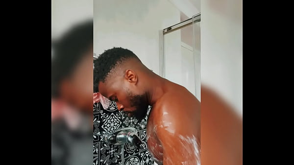 Sexy black man showering