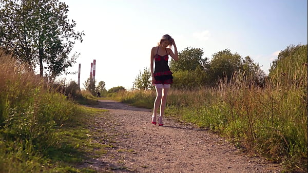 Public pissing and masturbation of a blonde