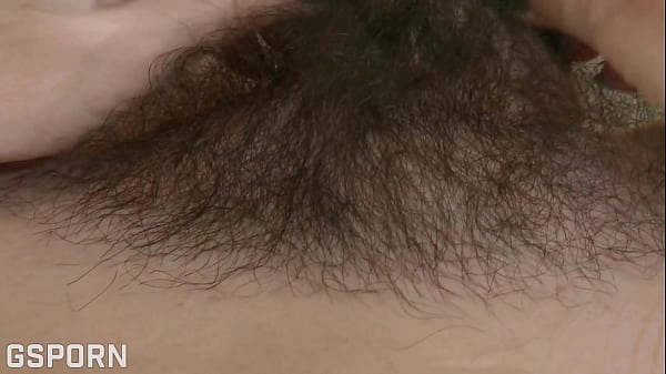 Hot natural brunette girl masturbating her hairy pussy