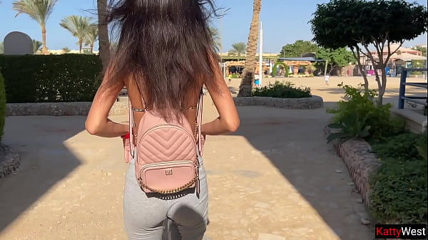 Crazy girl pee on a public beach right on her pants!