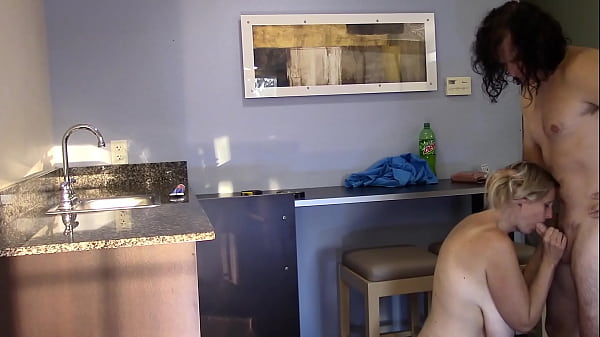 Milf fucked in kitchen gets a cumshot on her huge tits