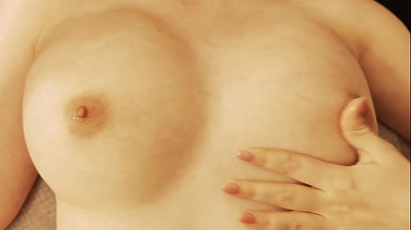 Cutie massages her slippery tits and jerks off