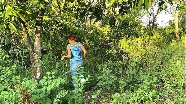 fund this girl looking for mangos in the woods