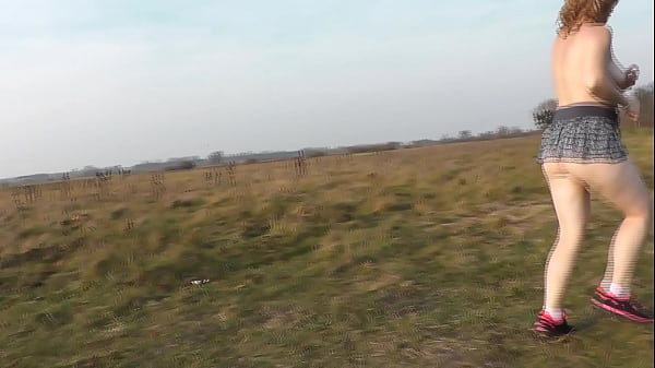 Naked in public. Nude in public. Outdoors without panties and bra Sexy MILF Frina play Sport at stadium outside. Public. No panties. Naturist. Outdoor. Nudist