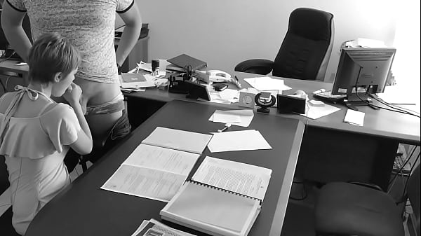 The boss fucks his tiny secretary on the office table and films it on hidden camera