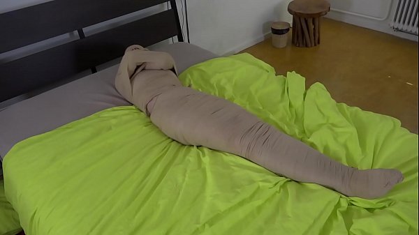 Blue haired Teen girl put in mummification