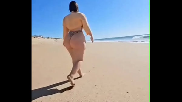 And just a girl on the beach Thumbnail