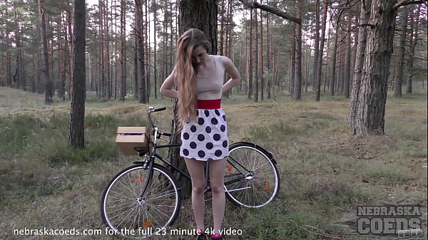 skinny areana fox riding a bicycle nude outdoors in a forest and masturbating
