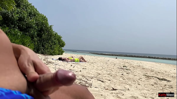 Pervert cummed on girls while they were sunbathing on a public beach