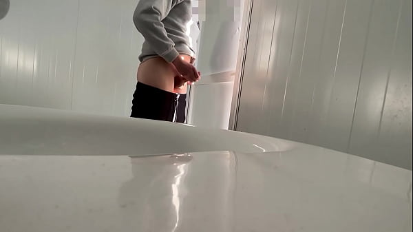 I surprise a girl who catches me jerking off in a public bathroom on the beach and helps me finish cumming