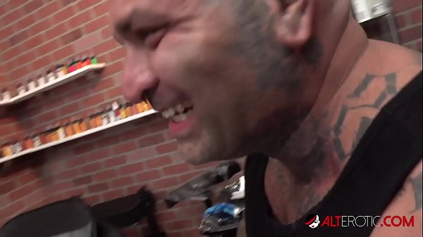 Tiger Lilly gets a forehead tattoo while nude