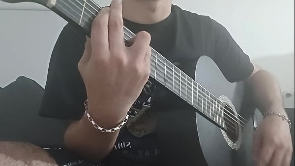 Once again, playing the guitar. Thumbnail