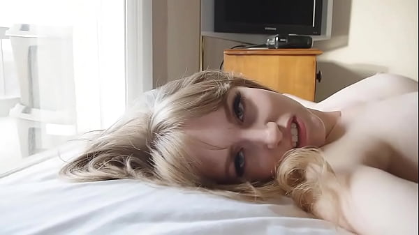 Busty Teen Scarlet struggles to free herself after being tied down to the bed.