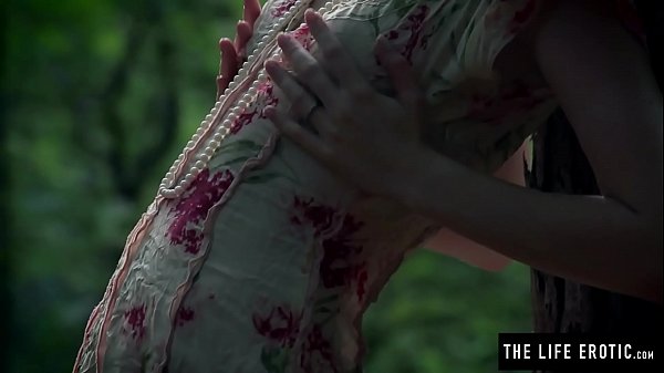 Skinny girl fucks herself hard in the forest