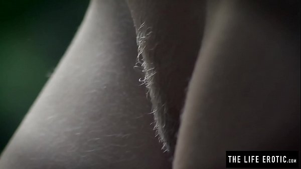 Skinny girl fucks herself hard in the forest