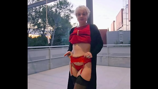 Perite red suspender dress at work in sexy fashion Thumbnail