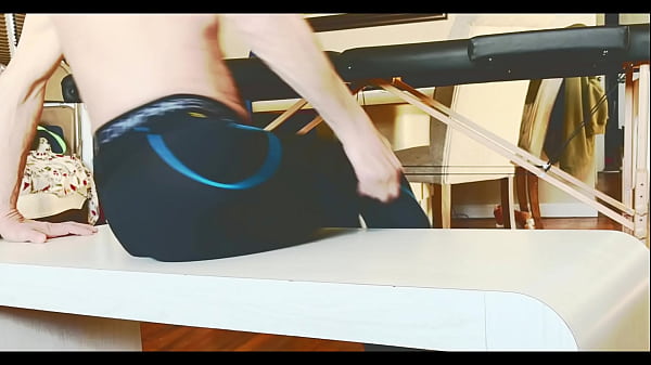 Stop Action Stretching on Table in Compression Tights and Groin Brace