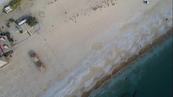 Drone exibitionism on Nudist beach