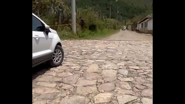 Two lesbians touch each other to orgasm on the corner of a town trying to avoid being seen by anyone