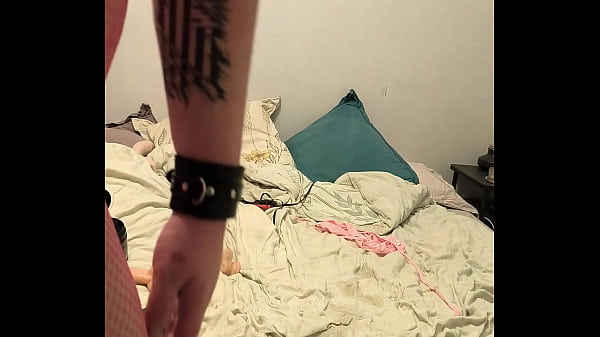 French travesti jinna in chastity enjoy a big dildo on her bed.