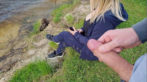 Jerk off a dick near a stranger girl in public