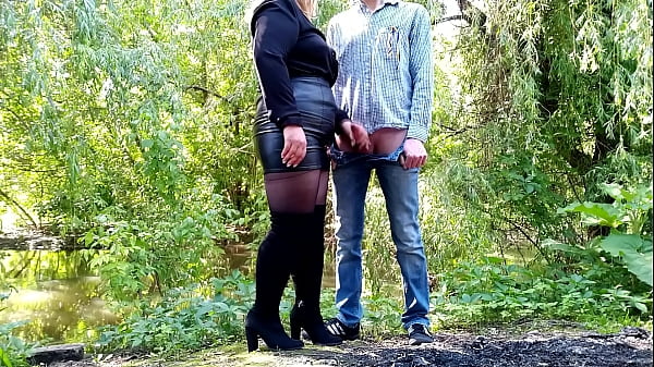 MILF milks cum outdoors for her sexy skirted ass